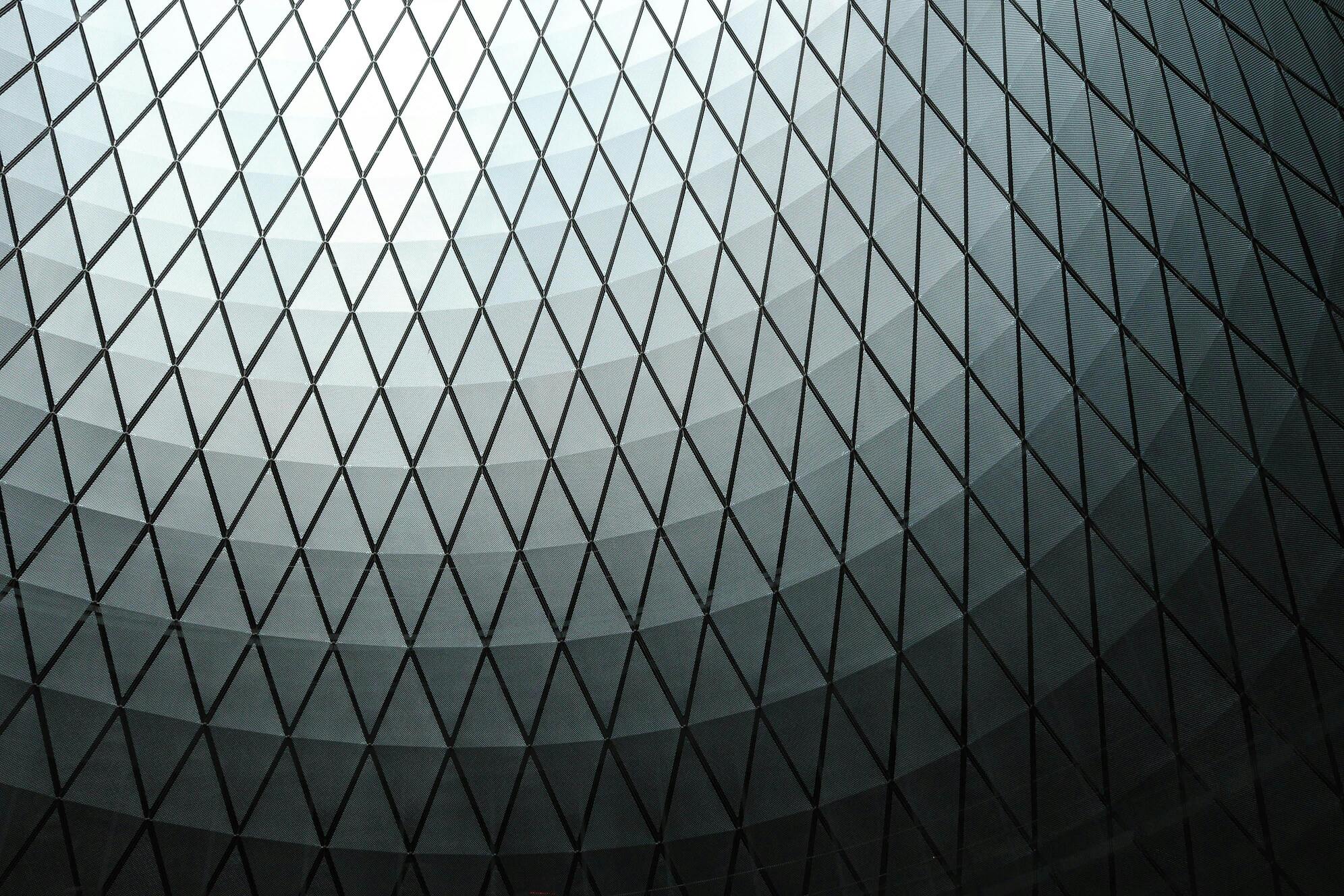 Aerial view of container port with cargo ships and stacked containers